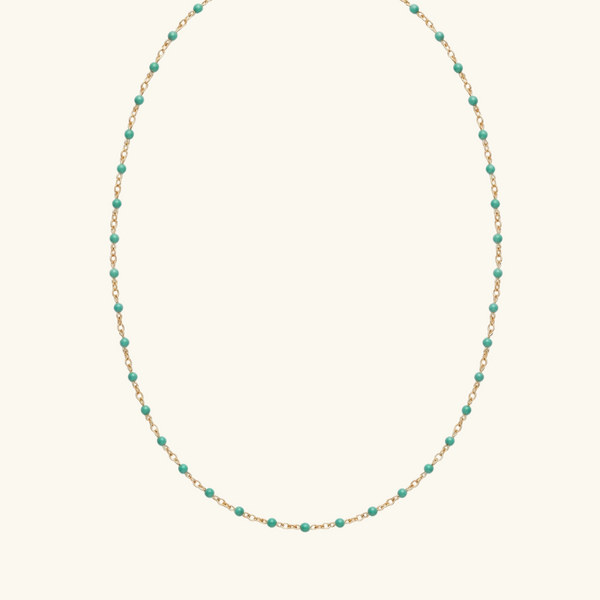 Necklace with turquoise beads on a white background