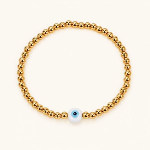 Beaded Evil Eye Bracelet with gold beads and a white and blue evil eye bead