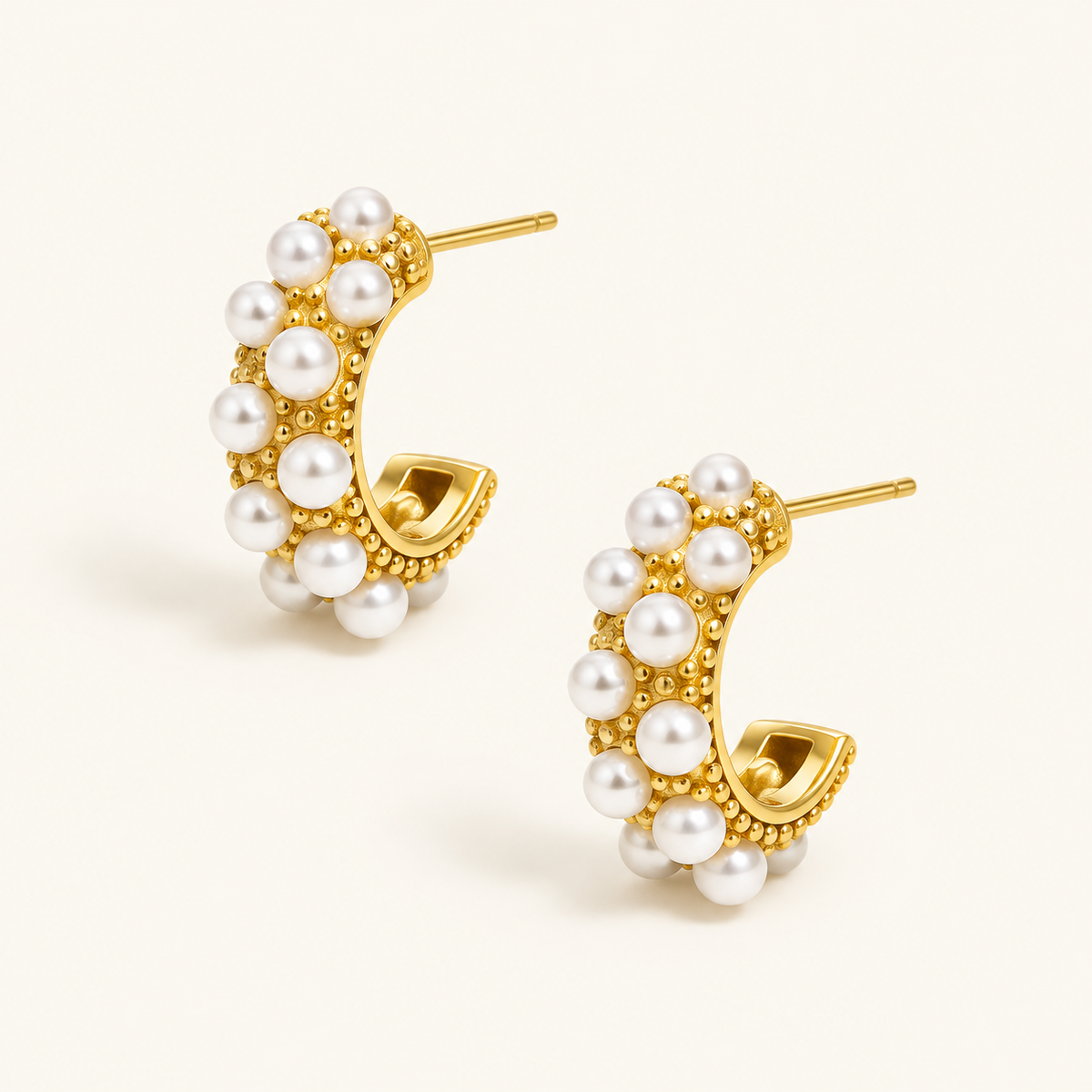 Bubble Pearl Earrings with white pearl detailing on gold-tone half hoops