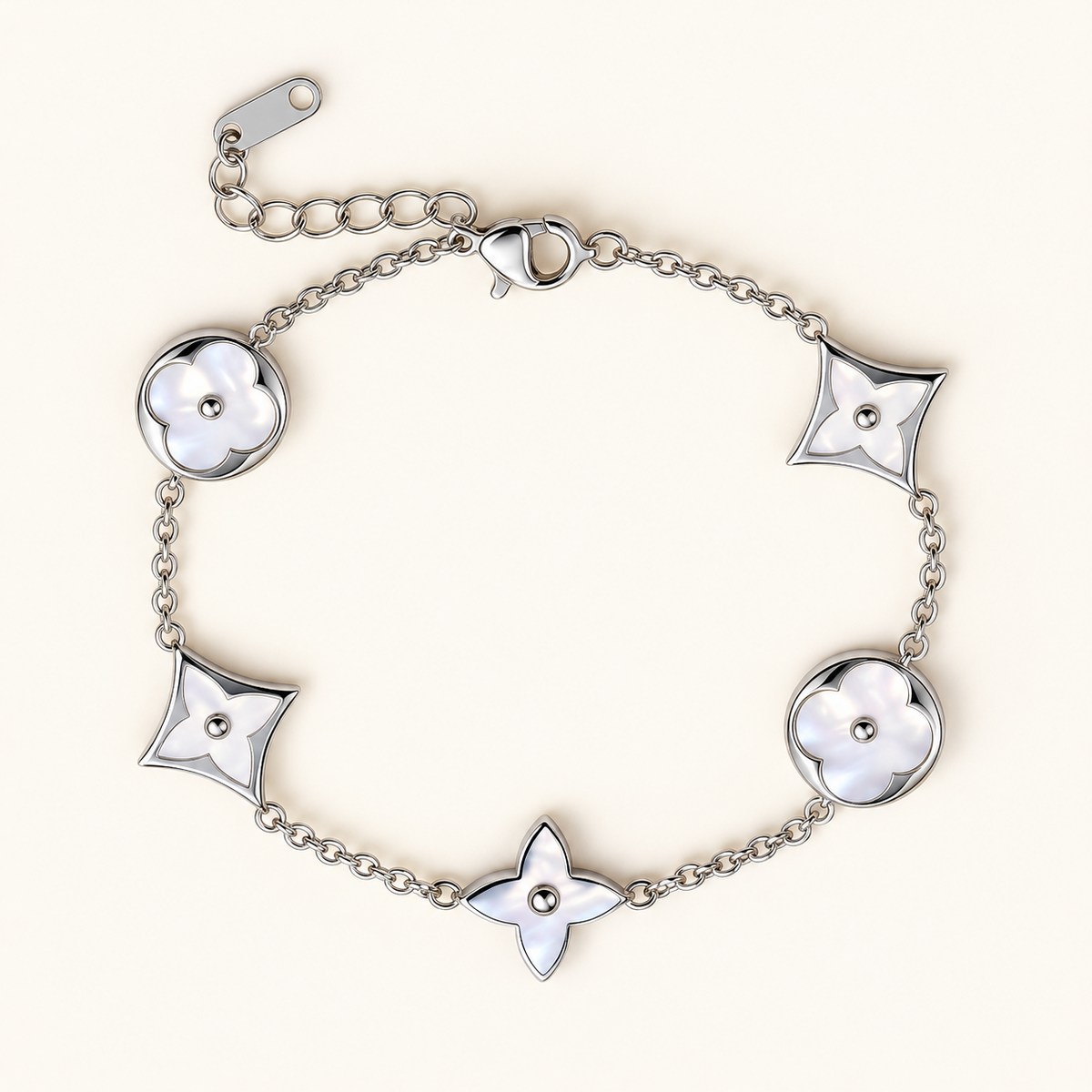 Silver Clover Shell Bracelet on a warm ivory background