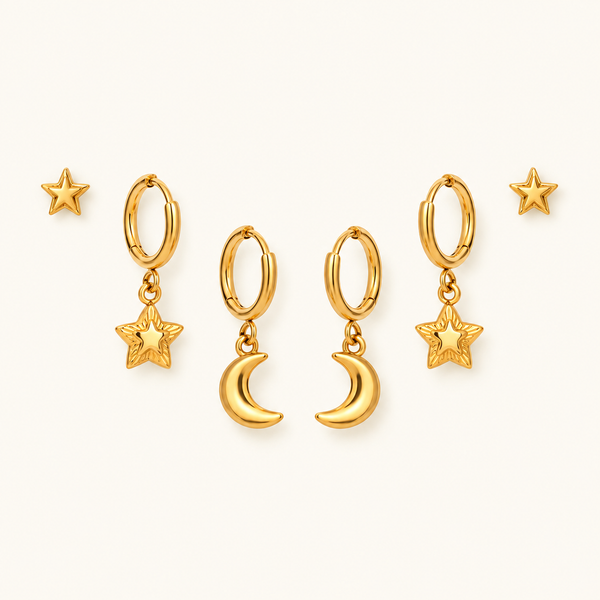 Star and Moon Earring Set in gold, symmetrically arranged on an ivory background