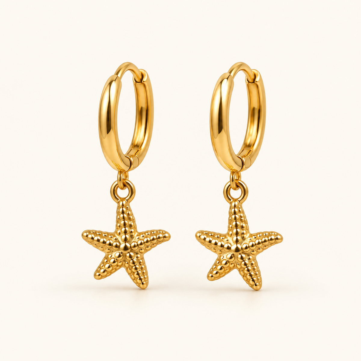 Gold starfish hoop earrings