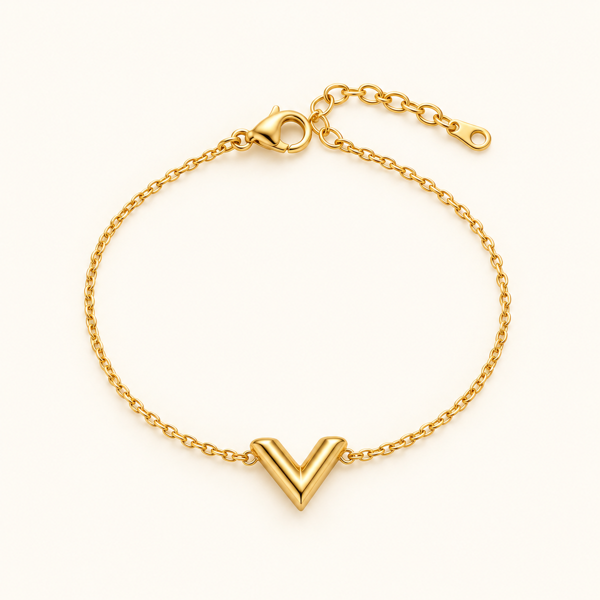 Gold V-Shape Bracelet on a warm ivory background